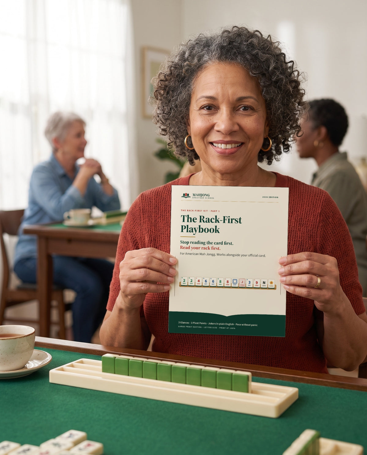 A player holding the printed Rack-First Playbook