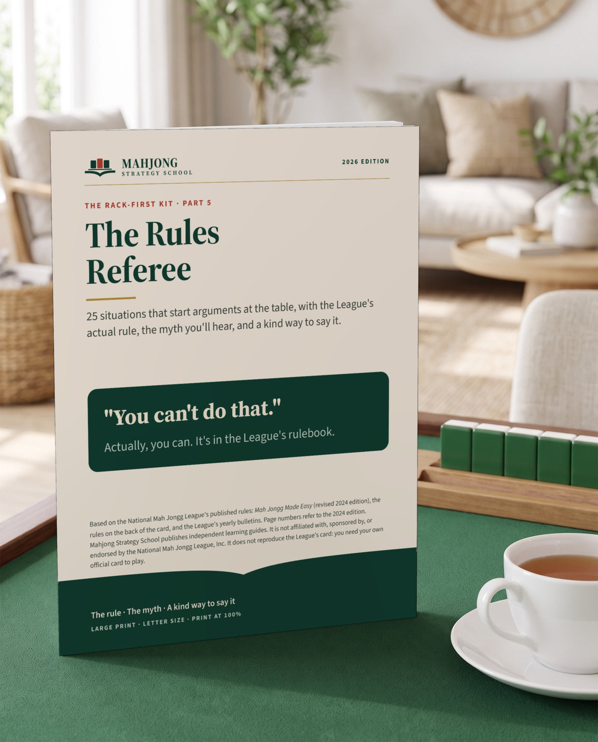 The Rules Referee booklet on a green mahjong table